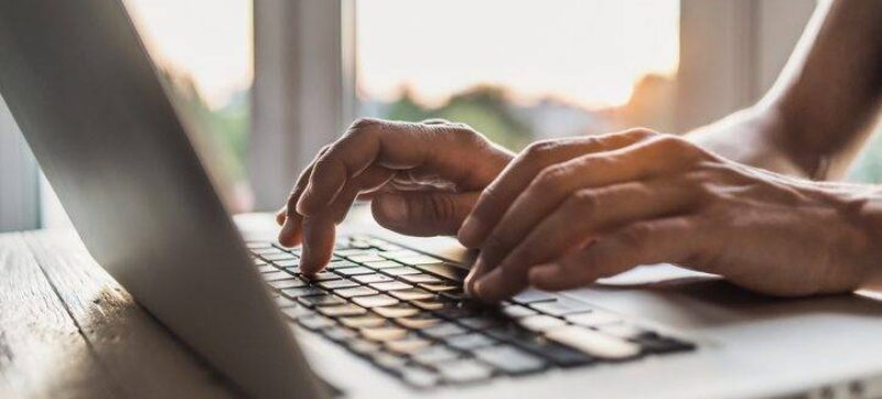 Businessman using laptop computer in the office