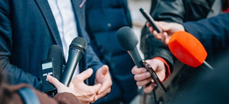 Interviewing businessman or politician, press conference